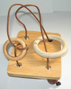 Juegos topol&oacute;gicos con aros y cuerdas